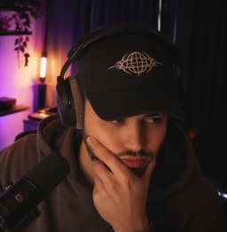 A creator stuck mid-edit at their desk